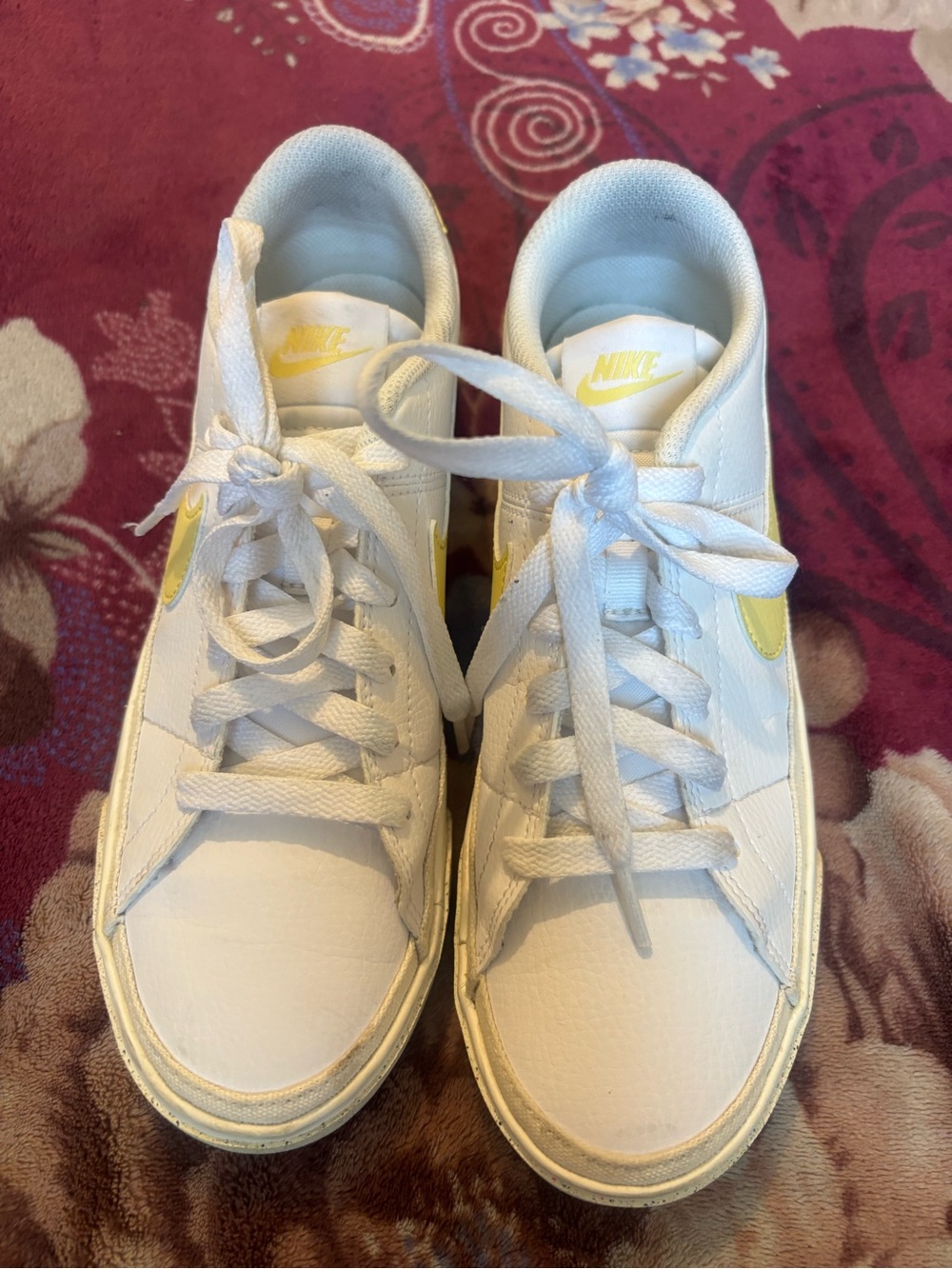 Nike Women’s White Sneakers with Yellow Swoosh Accent